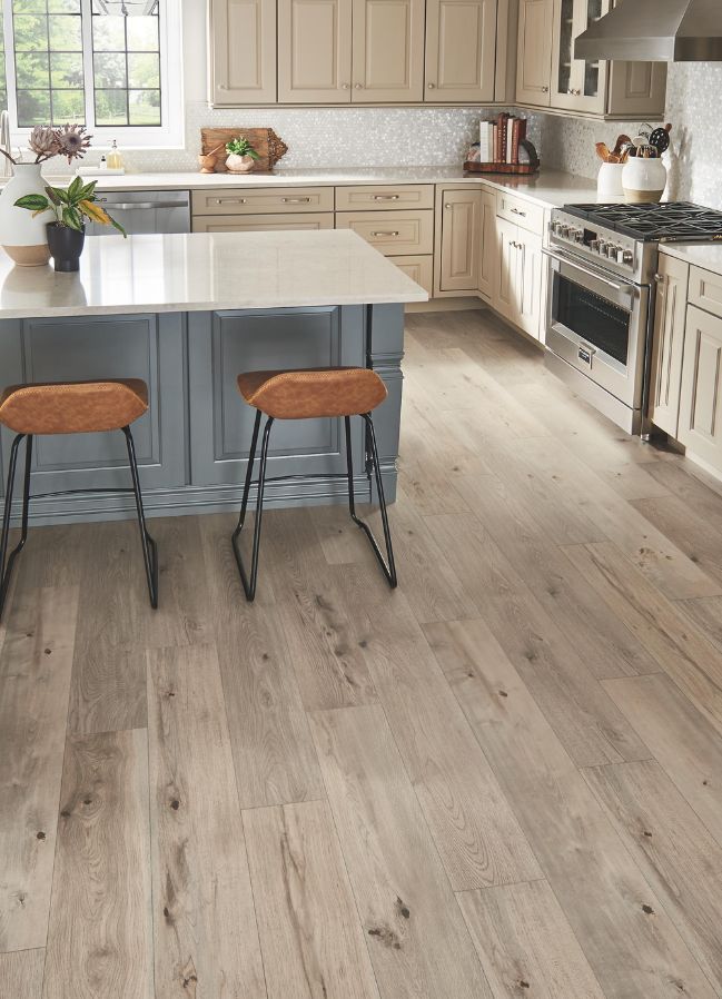 wood look laminate flooring in a ktichen