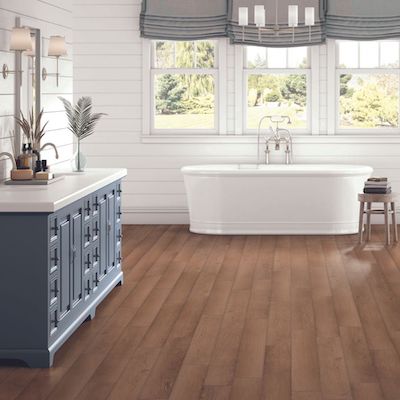 waterproof luxury vinyl plank flooring in a charming Melbourne, FL, bathroom